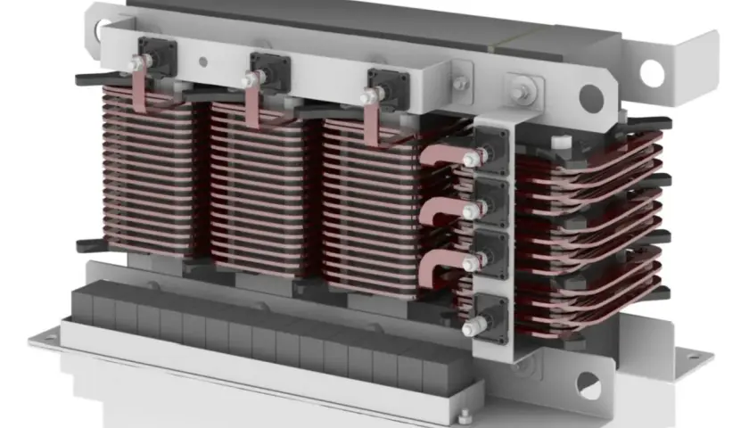 Dreiphasiger **common mode filter** mit Kupferwicklungen und Ferritkernen, montiert auf einer Metallbasis.